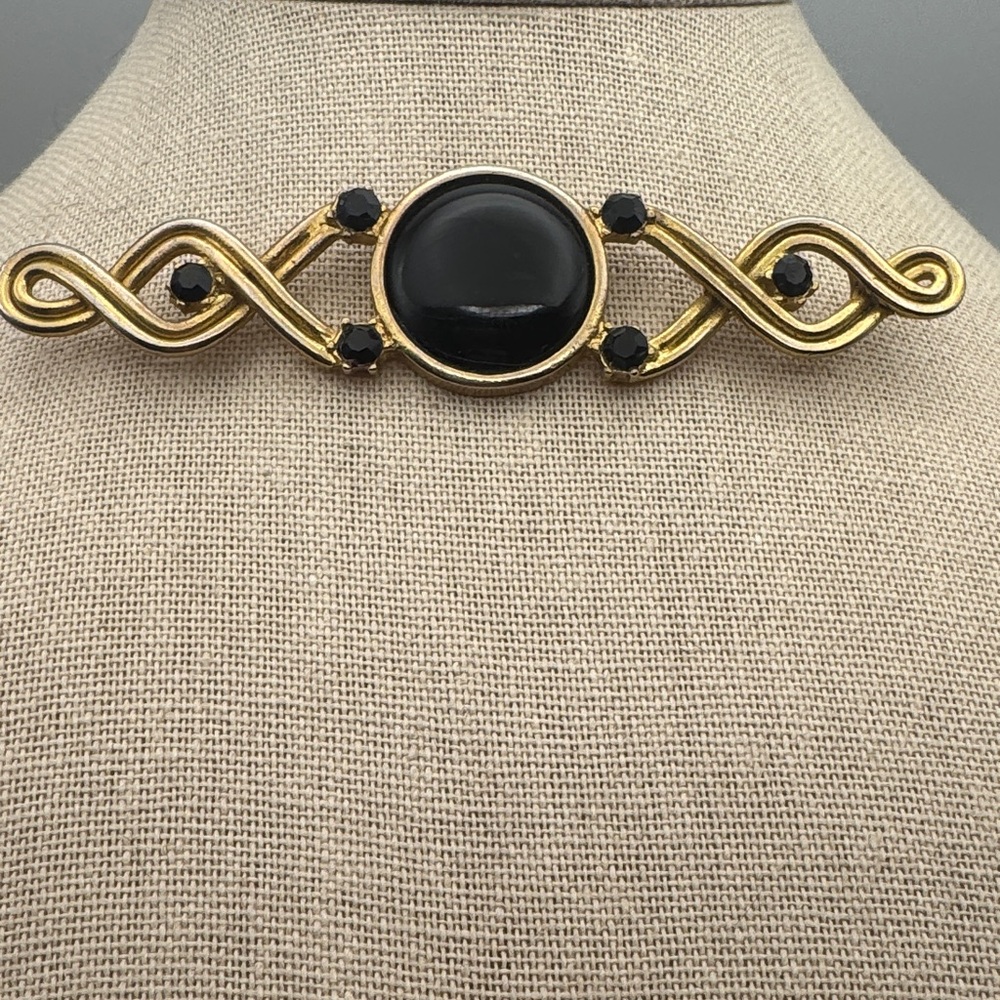 Vintage Carol Duplaise Gold-Tone Black Cabochon Scroll Brooch